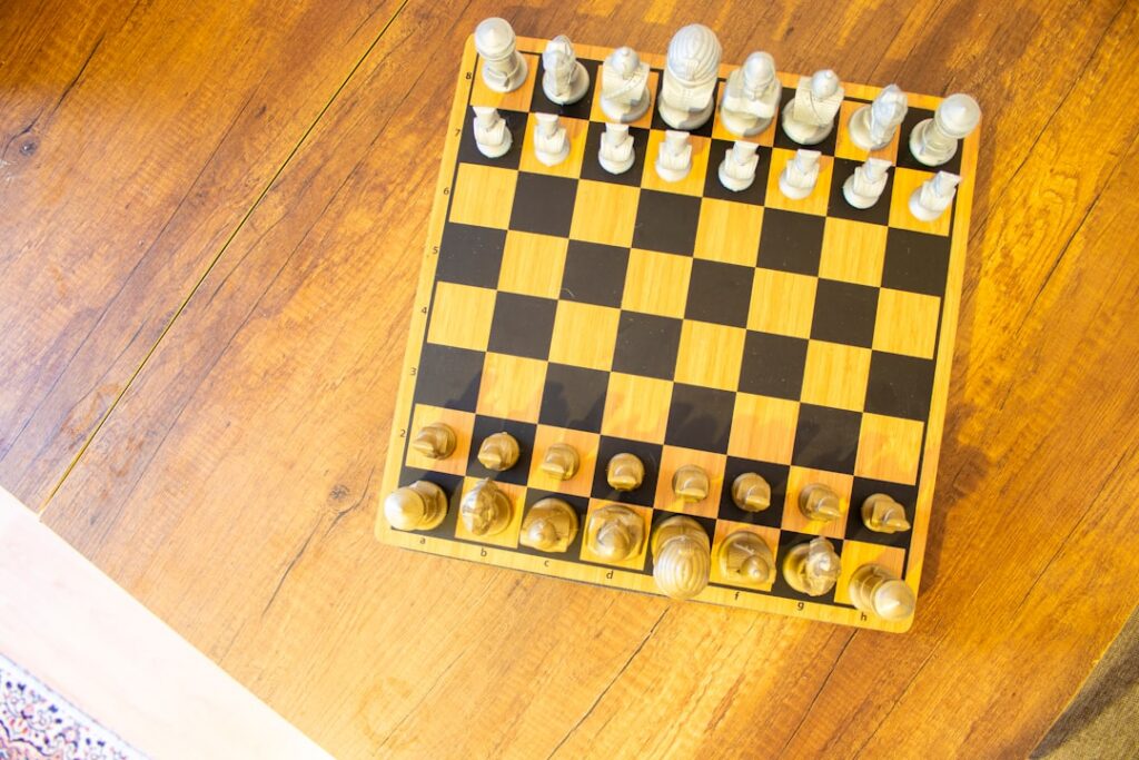 Sleek, modern robotic hand strategically moving a chess piece on a board, symbolizing the shift from simple instructions t...