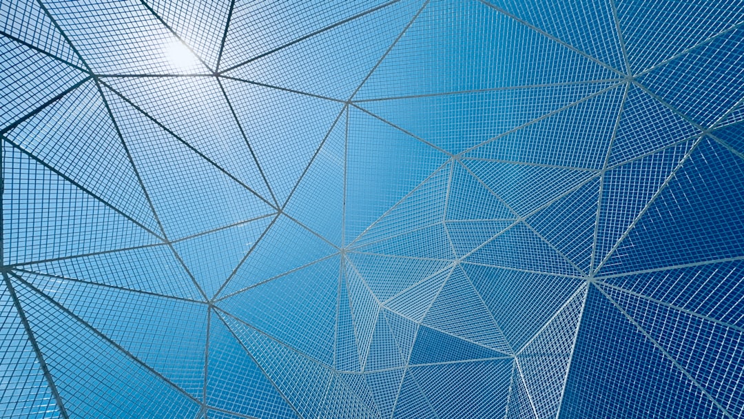 An abstract visualization of a data network with glowing blue nodes and interconnected lines, symbolizing the intelligent and non-linear flow of a cognitive system.