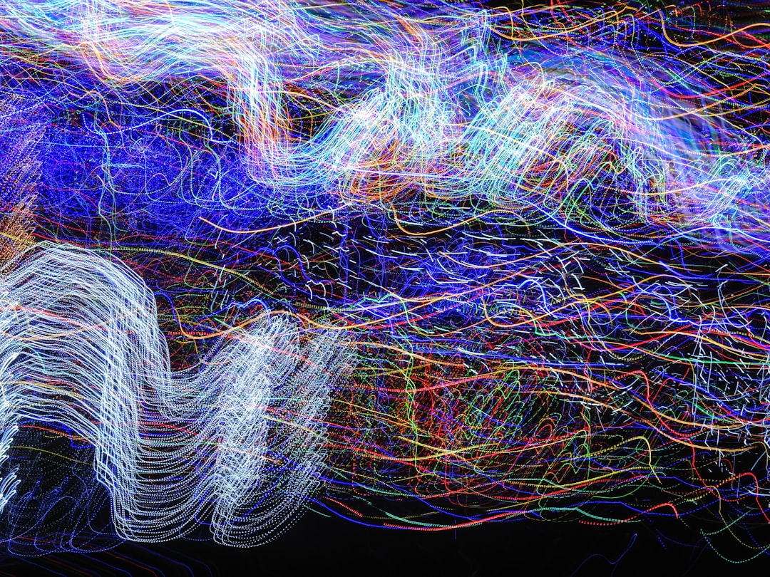 A dark, abstract image showing interconnected glowing blue nodes and lines, visualizing a complex neural network and the concept of an autonomous AI workforce.