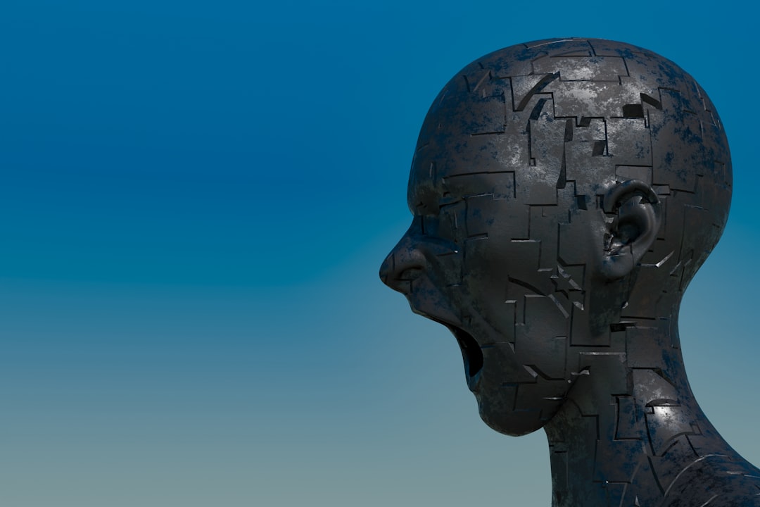 A minimalist 3D wireframe rendering of a human head against a clean background, representing the digital construction of data to train AI agents.