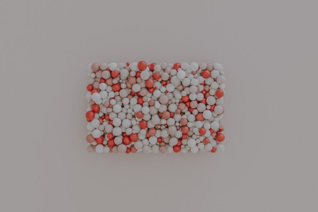 Single, brightly colored object stands out in a sea of identical white objects, symbolizing a business escaping the AI hom...